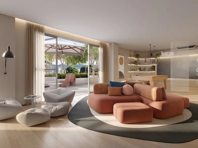 Espaço Jovem do Glória Residencial com sofás e games