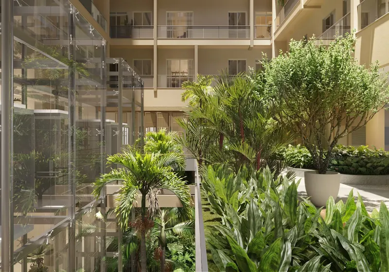 Jardim Carioca do Glória Residencial, com elevadores panorâmicos e vegetação tropical